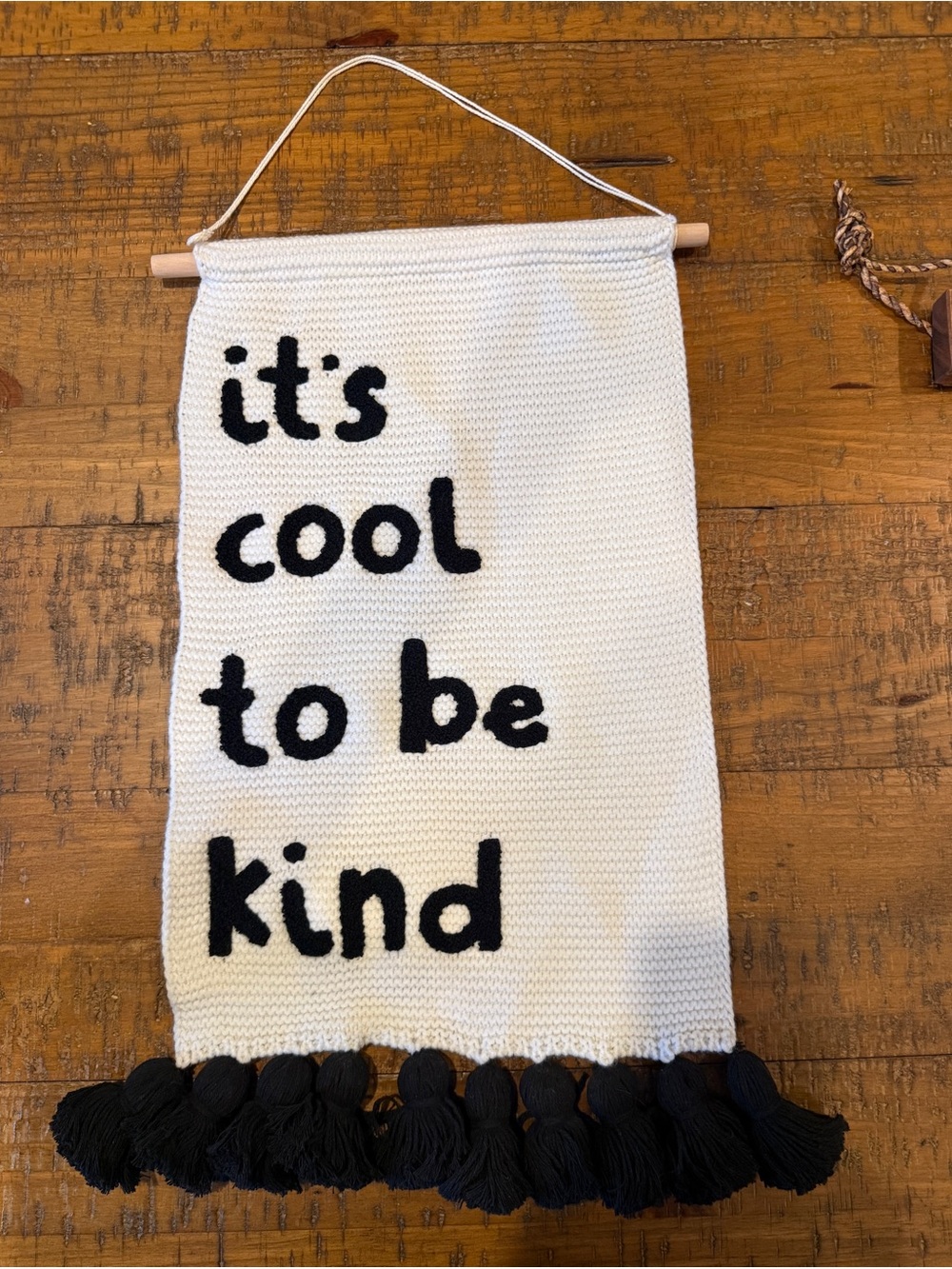White and Black "It's Cool to be Kind" Wall Hanging